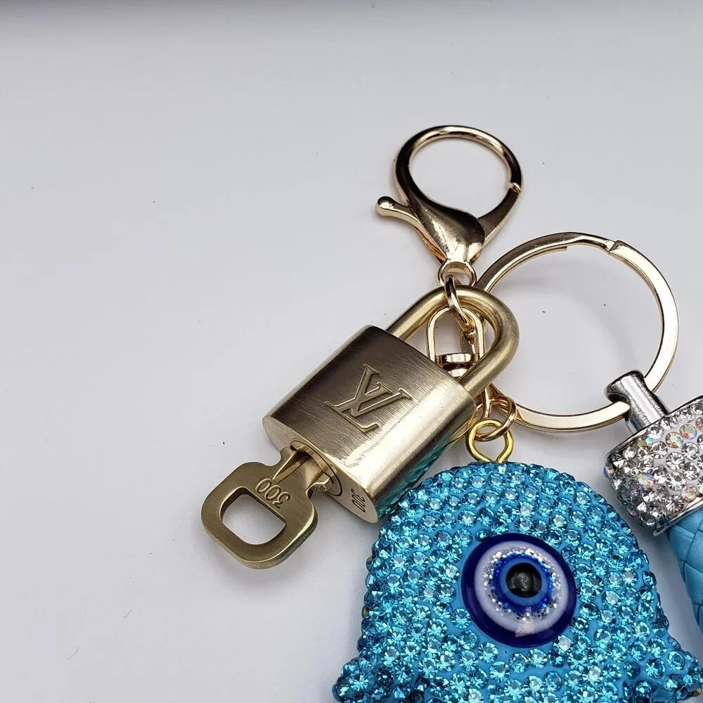 Authentic Louis Vuitton Lock & Key with unbranded Evil Eye Bagcharm 011526